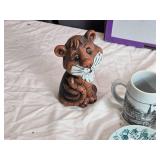 Miscellaneous Decorative Items Including Tiger Figurine, Ceramics, and U.S. Polo Assn. Wallet