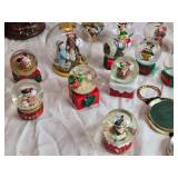 Collection of Holiday Themed Snow Globes and Decorative Items (a few have no fluid)