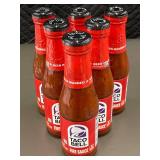 Group of 6 Taco Bell Fire Sauce Bottles - Packaged and Unopened