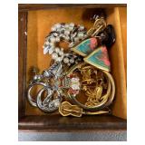 Vintage Jewelry Collection with Intricate Pieces in Decorative Wooden Box