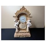 Vintage Cherub Figure Quartz Clock with Ornate Base