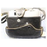 Collection of Vintage Cameras and Accessories Including Photo Adapters and Flashcubes