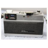 Collection of Vintage Cameras and Accessories Including Photo Adapters and Flashcubes