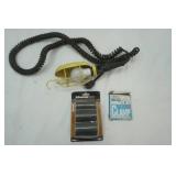 hanging shop light, radiator hose repair kit, muffler clamps