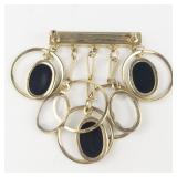 Dazzling Black & White Gemstone Dangling Gold Plated Base Metal Brooch .