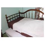 Vintage Wooden Daybed with Trundle Feature and Bedding