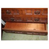 Vintage Wooden Cabinet with Decorative Panels and Drawers