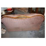 Vintage Two-Seater Loveseat with Decorative Pillows and Wooden Backrest