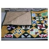 Handcrafted Patchwork Quilt with Colorful Patterns