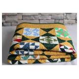 Handcrafted Patchwork Quilt with Colorful Patterns