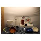 Mixed Kitchenware Collection Including Bowls, Kitchen Tools, and Vikings Mug