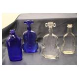 Set of 4 Vintage Musical Instrument-Shaped Glass Bottles