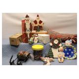 Vintage Holiday Decoration Collection with Santa Figurines, Doll, and Decorative Bowl