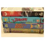 Lot of 7 VHS Tapes Including Disney Classics and Hanna Barbera Favorites