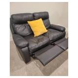 Dual Reclining Faux Leather Loveseat in Black.