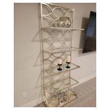 A pair of Uttermost Lashaya-Etagere in gold. Plus all shown decor.