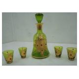 Antique green glass decanter set. Sticker on bottom says made in Italy