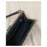 Coach Black Patent Leather Handbag with Metallic Frame