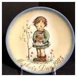 Three Vintage Hummel Plates including; Vintage Mother Day 1978 "Afternoon Stroll", "Angelic Gifts" and "Spring Bouquet"