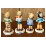 Four Cute Vintage Hummel Figurines including Hummel Figurine Steadfast Soprano and Honor Studen.