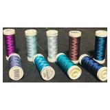 Bin of Assorted Blue and Purple Thread Spools