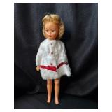 VINTAGE PEPPER DOLL WITH WHITE AND RED COAT