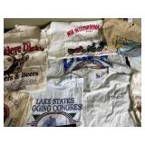 Collection of Vintage Graphic Tees in Various Sizes