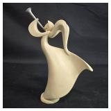 Abstract Figurine of a Woman Playing a Trumpet - Made in China