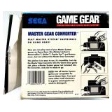 Lot of SEGA GENESIS Miscellaneous items including game case, SEGA GAME GEAR Master Gear Converter & More