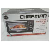 NEW IN BOX. Chef man Countertop Oven. 1000W.