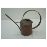 copper watering can