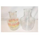 Set of 2 Glass Beverage Containers or Vases, one with Floral Design and one with Ribbed Texture