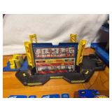 Hot Wheels Garage Set with 3 New in Package Vehicles