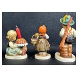 Three Collectible Hummels - Sensitive Hunter, Birthday Cake and On Holiday -Girl with Umbrella and Basket