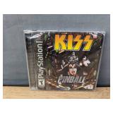 Collection of KISS Memorabilia: Psycho Gold Card, 2001 Daily Trivia Calendar, KISS City Coasters, Action Sterling 40 Marlin Diecast Car, and Playstation Pinball Game 2001