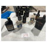 TABLE FULL OF HD FORK OIL, BRAKE FLUID DOT 4 & 5, & 10W40 MOTOR OIL