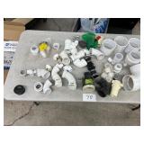 TABLE FULL OF PVC FITTINGS