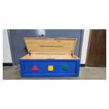 Colorful Wooden Toy Chest with Geometric Designs