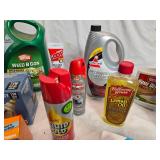 Assorted Household and Pest Control Products Including Weed Killer and Raid Foggers - Partially Full