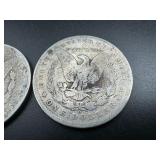 Two Bullion Grade Morgan Dollars, 1899 O, 1900 O