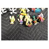 Collection of Classic Cartoon Character Figurines and Keychains