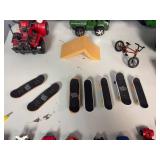 Lot of Assorted Miniature Vehicles and Fingerboards