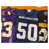 Collection of 4 NFL Team Jerseys Including Vikings, Broncos, Packers, and 49ers