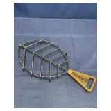 Metal wicker fish trivet