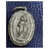 Sterling silver religious charm