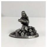 1973 International Pewter Man Stacking Wood