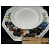 Various sizes and styles of clay marbles