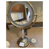 magnifying  mirror with light and little clock