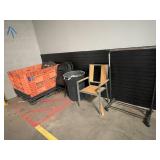 Orange crate, folding chairs, garbage bin, clothes