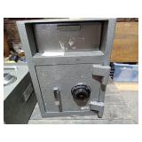 Heavy safe with combination and drawer